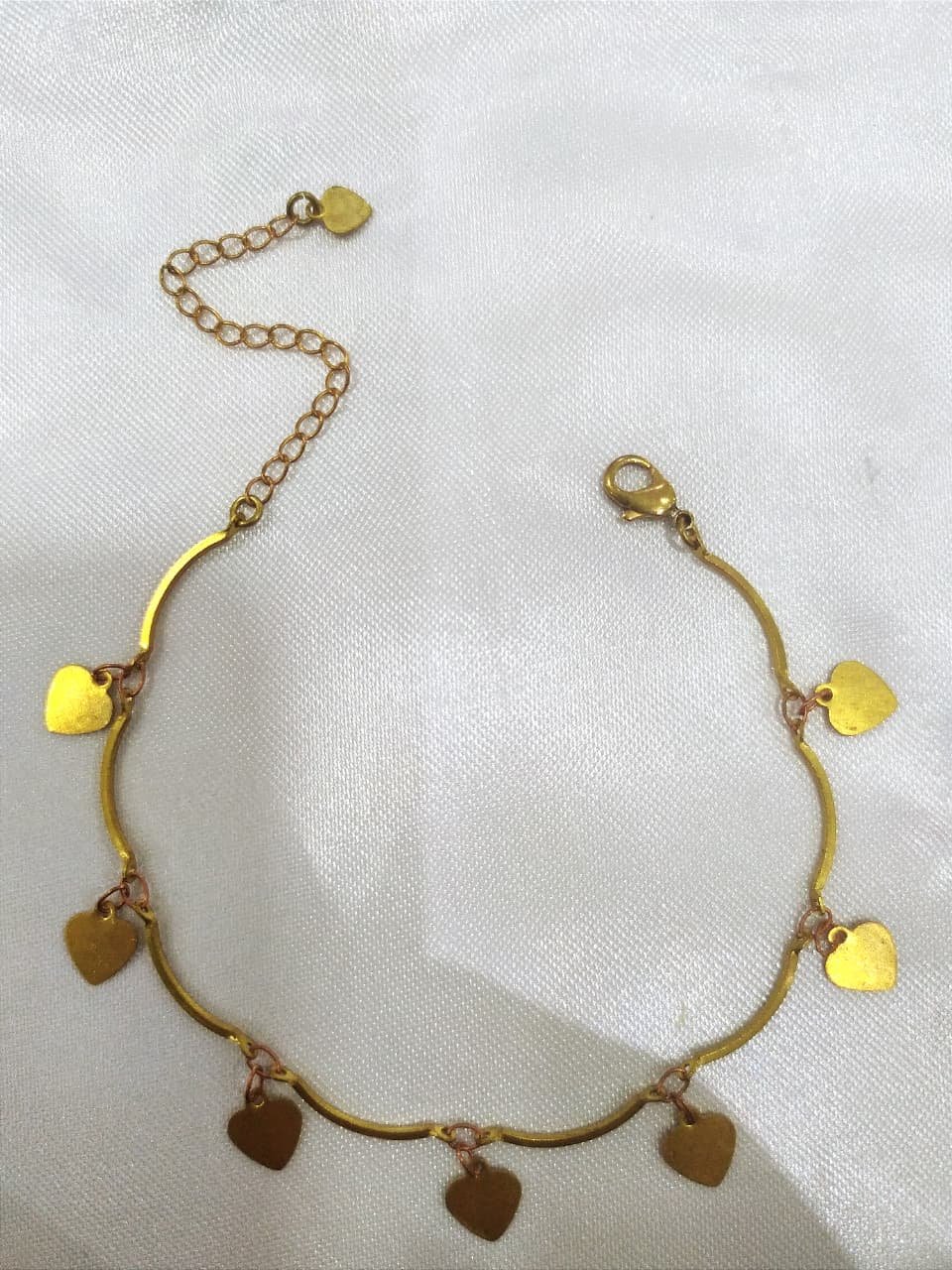 PULSEIRA DE PALITO COM CORAÇÃO LISO PENDURADO